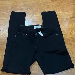 Audrey Hepburn style black stretch skinny jeans